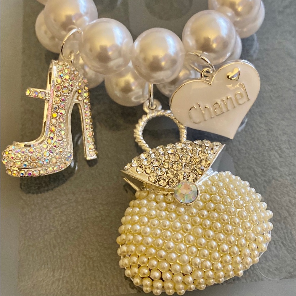 Beaded bracelet with charms